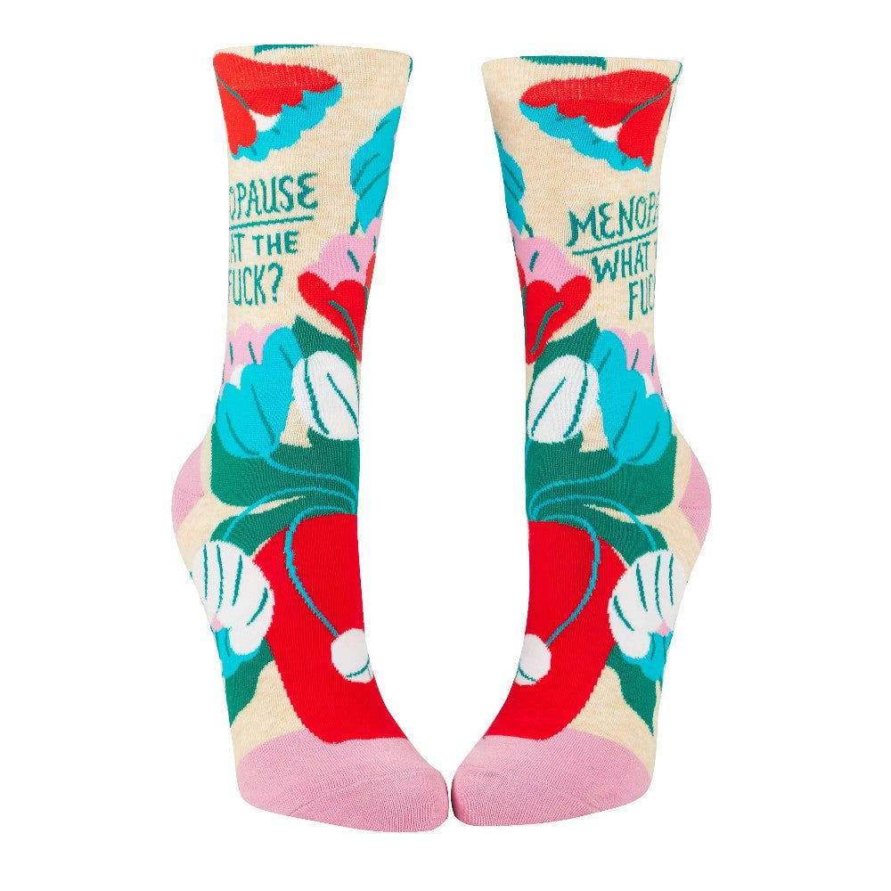 Colorful socks with floral design and bold text.