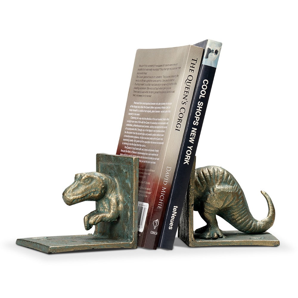Dinosaur bookends holding two books upright.