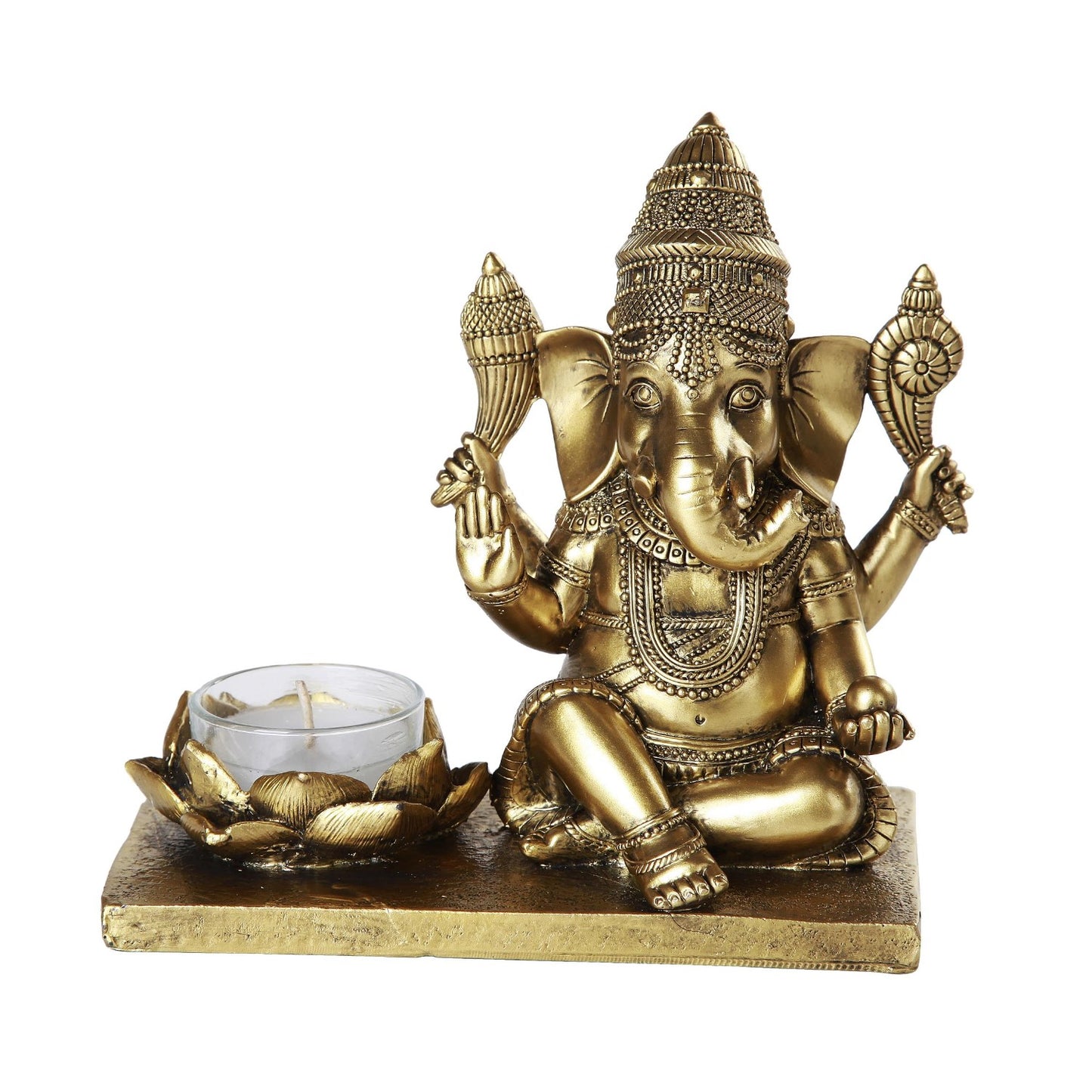 Golden Ganesha statue with intricate details, holding a small candle holder.