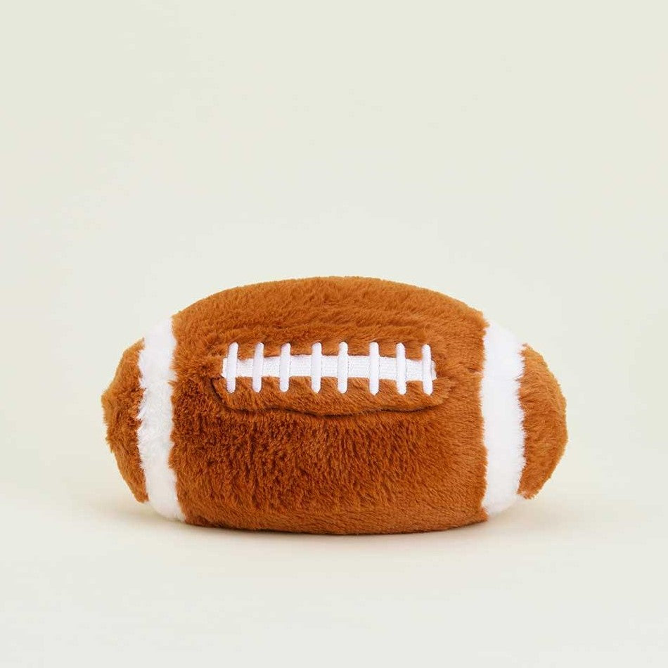 Brown plush football with white stitches.