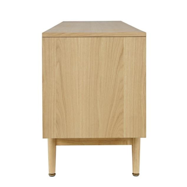 Light wood rectangular cabinet with tapered legs.