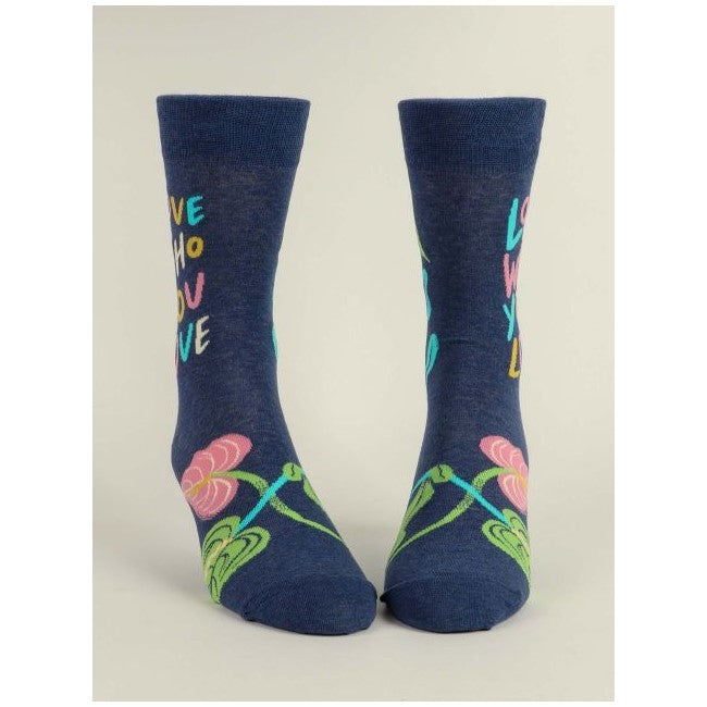 Blue socks with colorful text and flower design.
