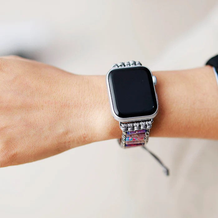Wearable tech with woven band on wrist.
