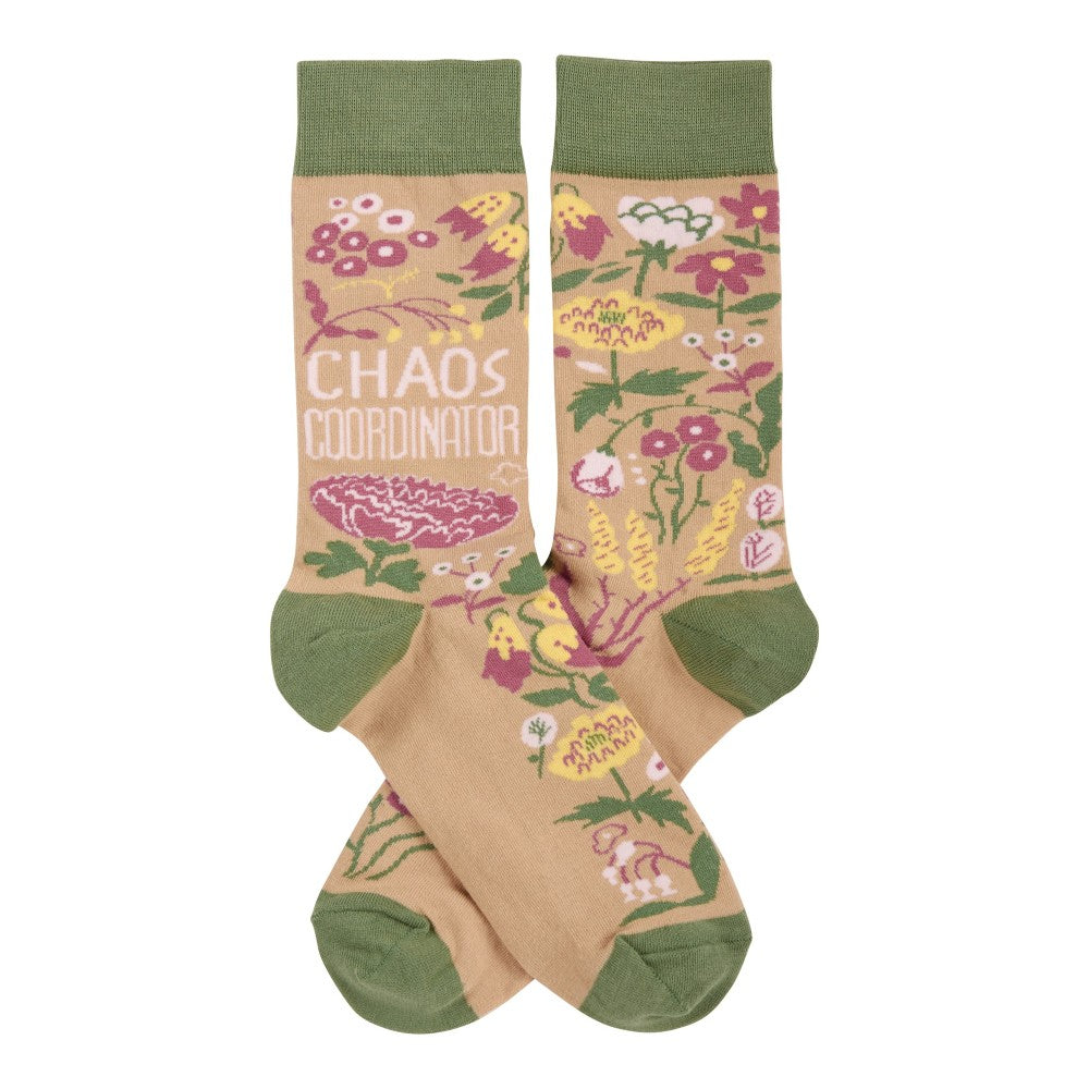 Colorful socks with a floral design and "Chaos Coordinator" text.