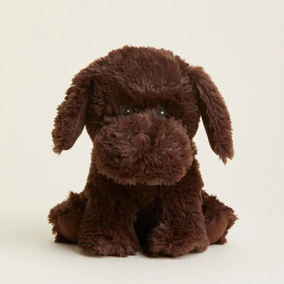 Fluffy brown plush dog with floppy ears against a plain background.