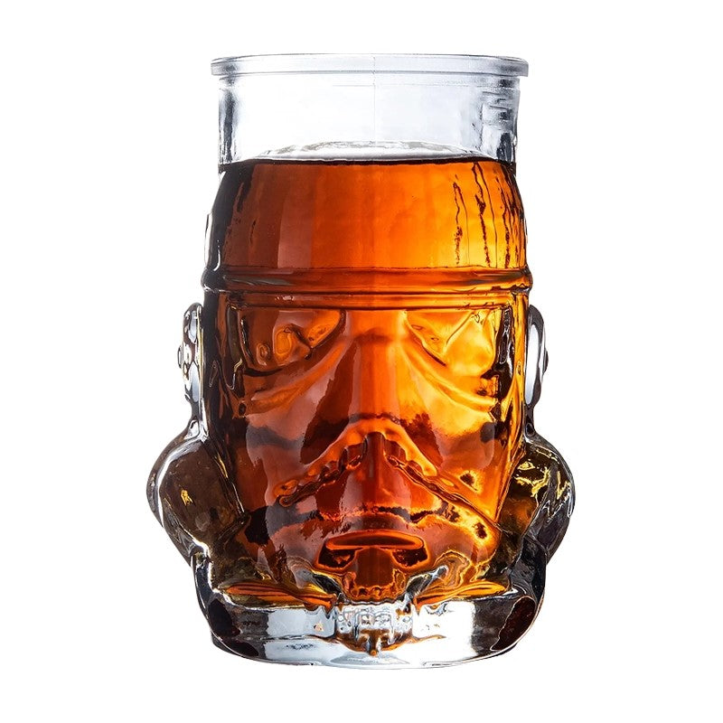 Stormtrooper glass filled with amber liquid.