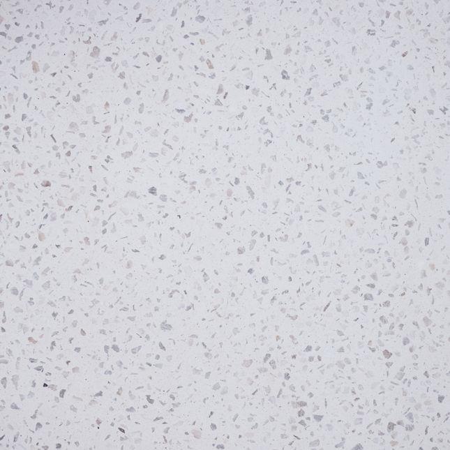 White terrazzo surface with gray and pink specks.
