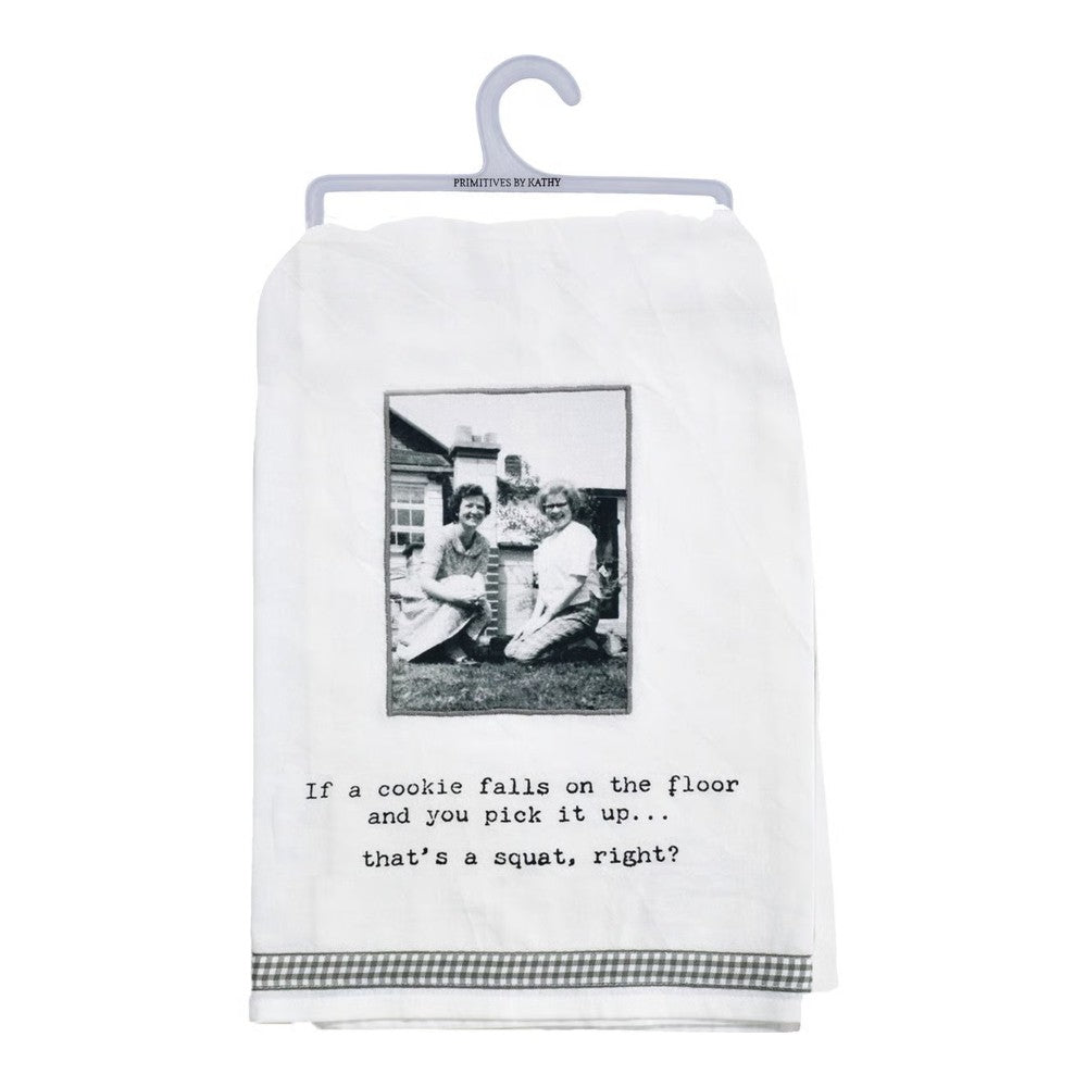 Tea towel with black-and-white photo, humorous text about picking up cookies.