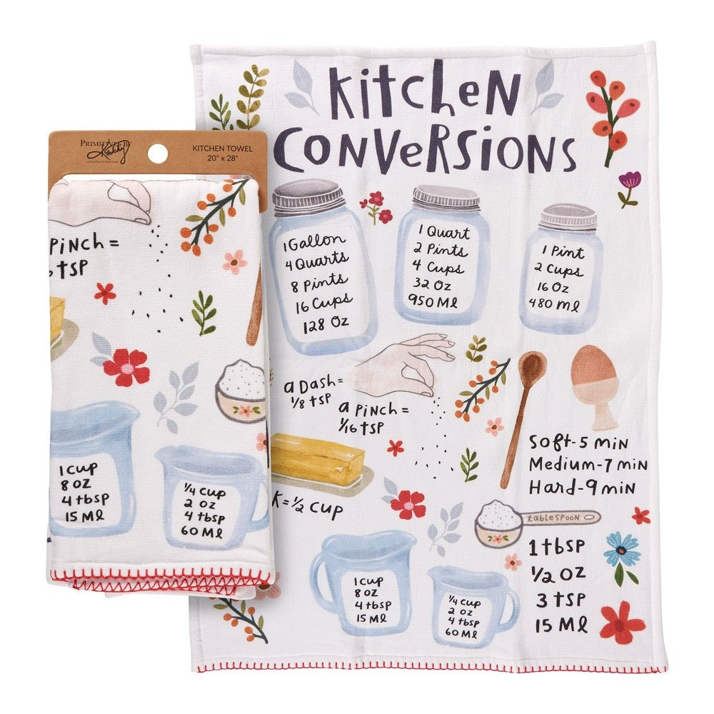 Colorful kitchen towel with cooking conversions chart and floral designs.