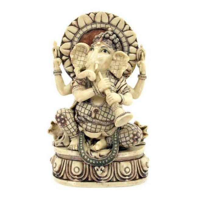 Elephant-headed deity statue playing a musical instrument, intricate and detailed design.