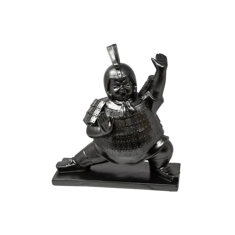 Warrior figurine in dynamic pose, wearing armor.