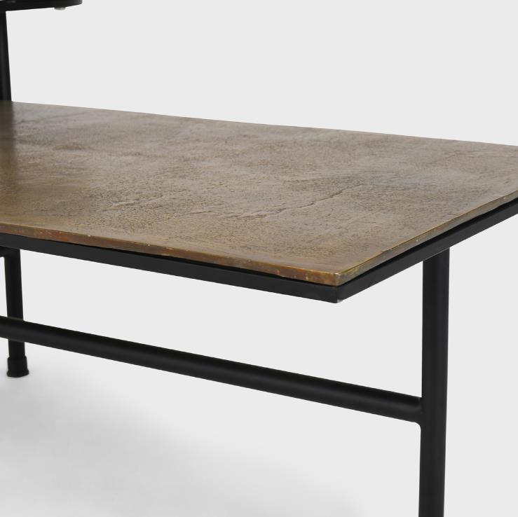 A table with a stone top and black metal frame against a plain background.