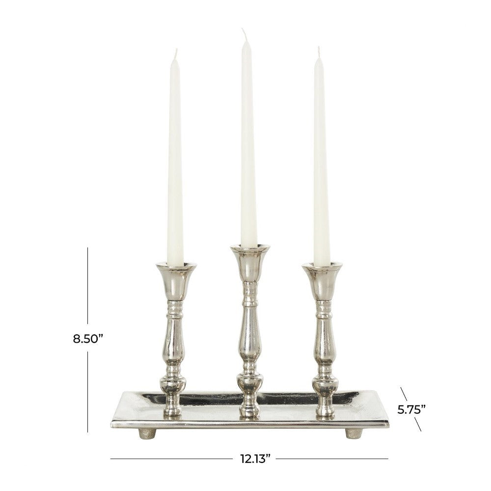 Silver candelabra with three white candles and dimensions displayed.