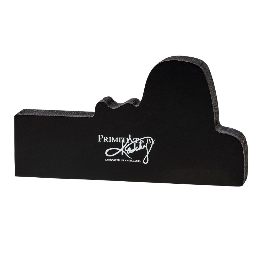 Silhouette shape with "Primitives by Kathy" logo in white.