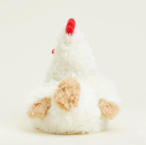 Fluffy white stuffed hen with red comb from behind.