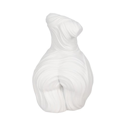 White abstract sculpture of a voluptuous human form with swirling patterns.