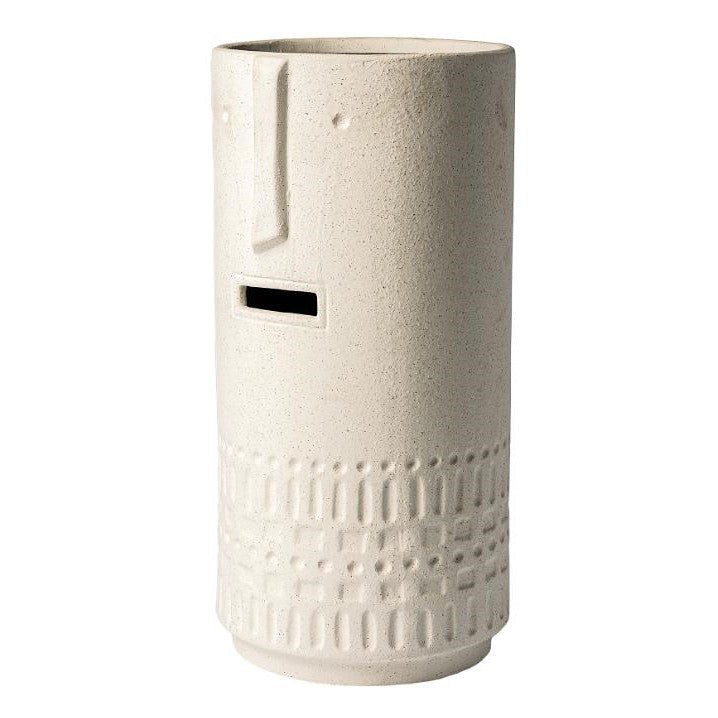 Textured white cylindrical vase with a minimalist face design.