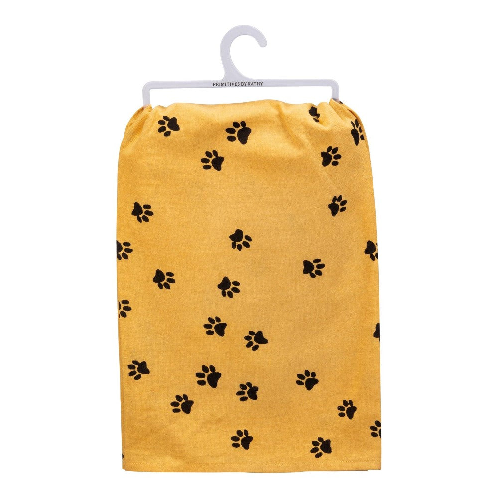 Yellow towel with black paw prints on a hanger.