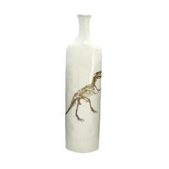 Tall white vase with dinosaur skeleton design.