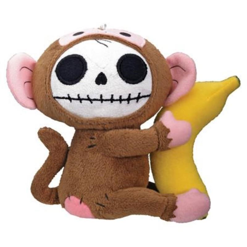 Cute monkey plush with a skeleton face holding a banana.