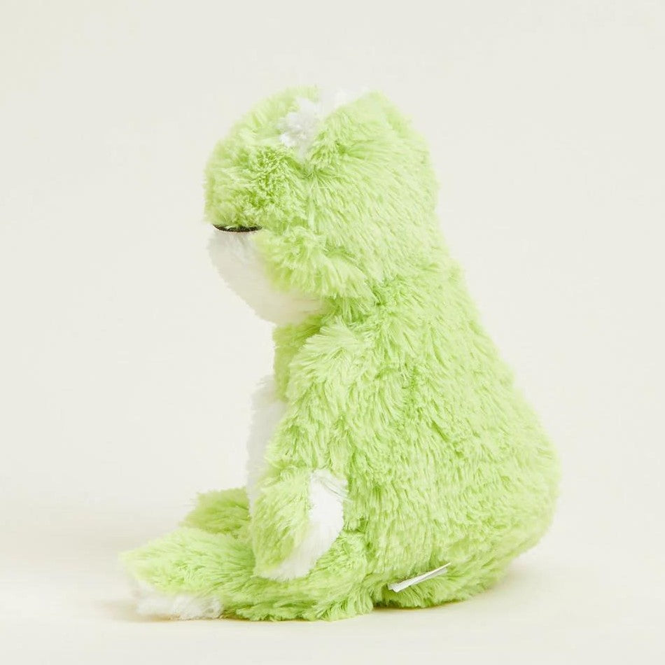 Green plush frog sitting, side profile view.