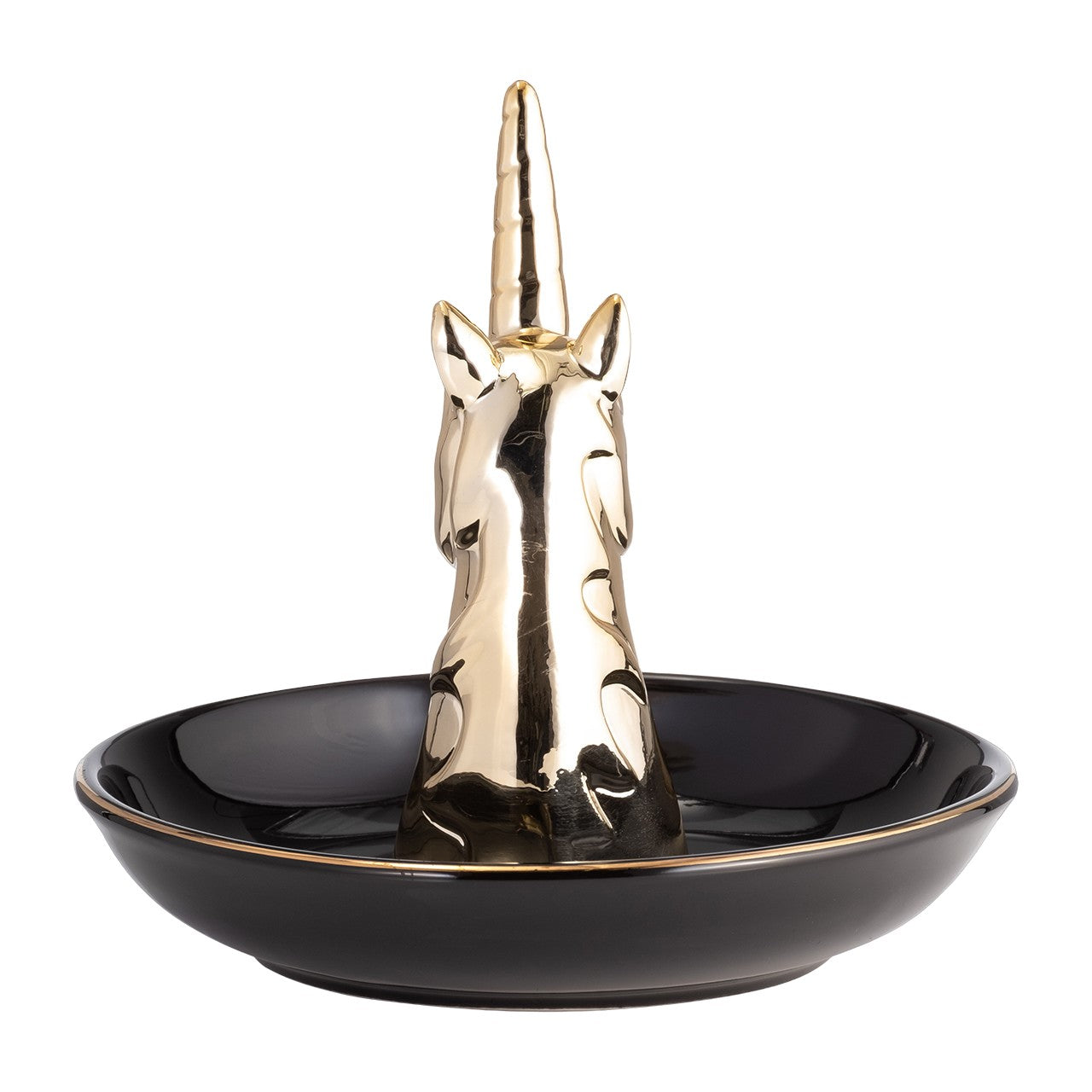Golden unicorn figurine on black dish.
