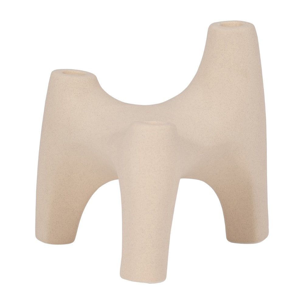 Beige abstract ceramic sculpture with four irregular legs.