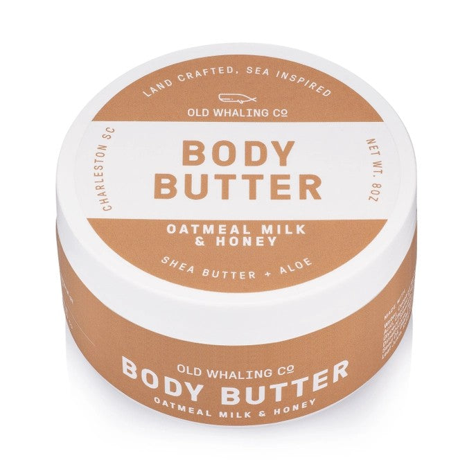 Round body butter container labeled "Oatmeal Milk & Honey."