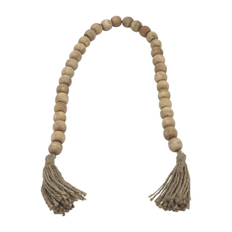 Wooden beads with tassels on a string.