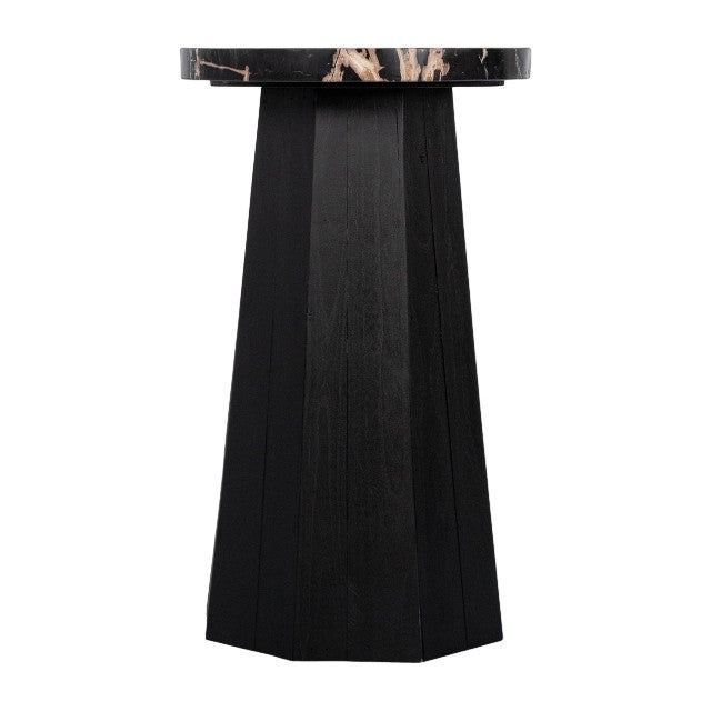 Black, geometric pedestal table with a marble top.