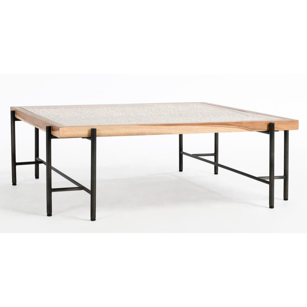 Modern coffee table with metal legs and wooden frame.