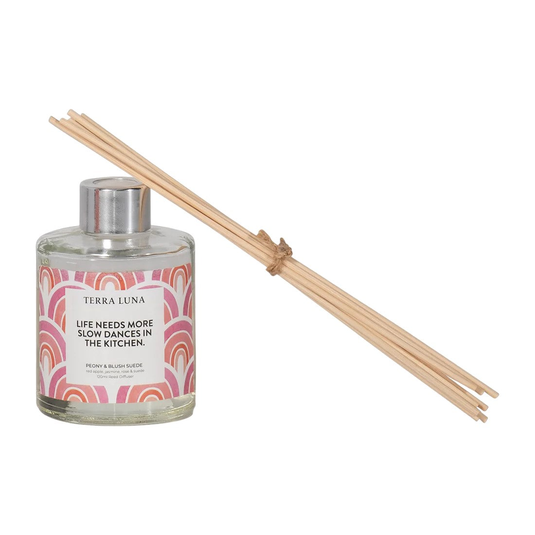 Aromatic diffuser with reeds and a quote about slow dances.