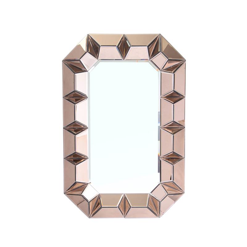 Octagonal mirror with a faceted, metallic frame design.