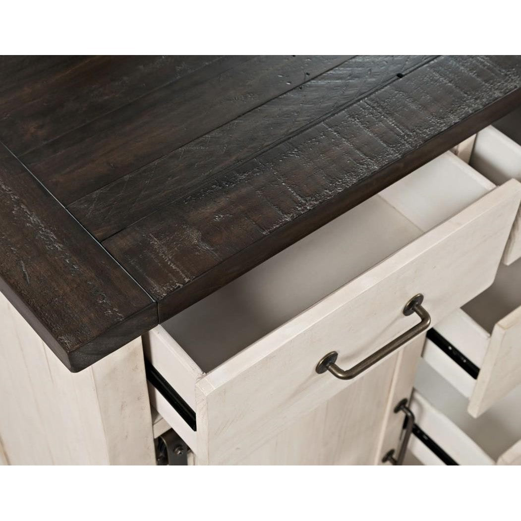 Wooden cabinet with open drawer, dark top, and metal handles.