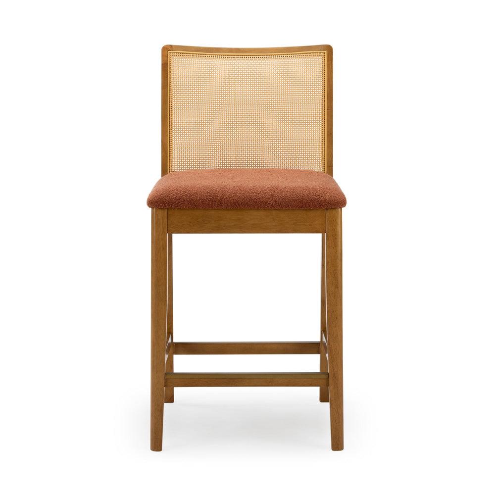 Wooden chair with woven backrest and orange cushioned seat.