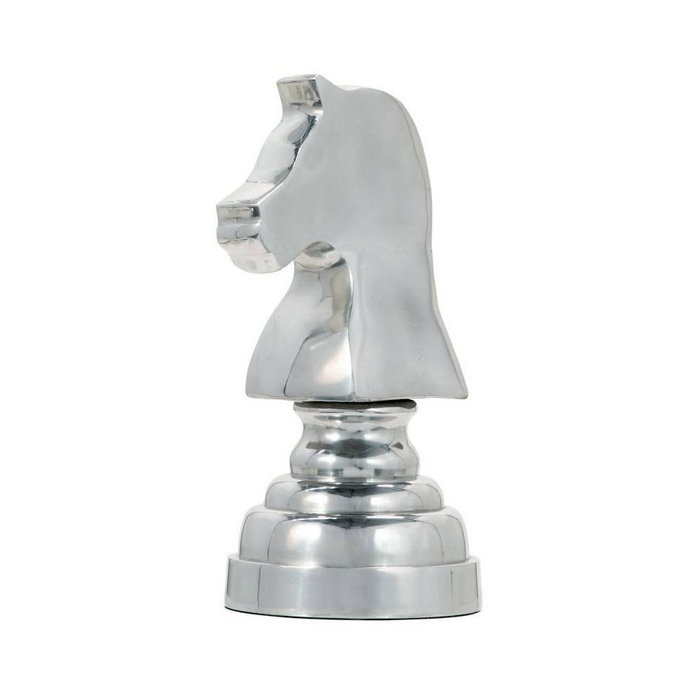 Silver horse chess knight piece standing upright.
