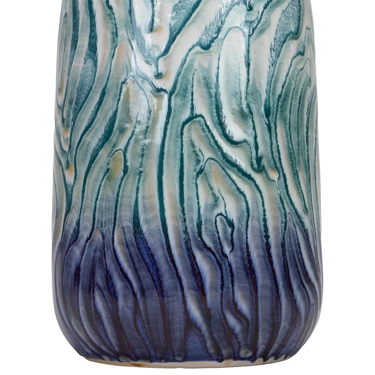 Textured vase with wavy blue and green patterns.