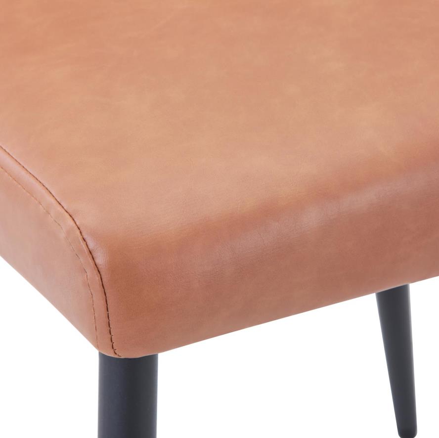 Brown cushioned seat with black legs, close-up view.