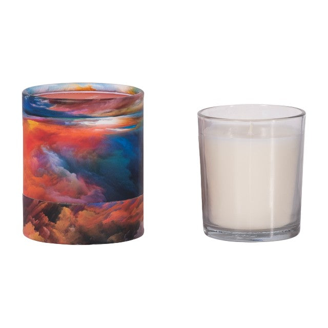 Two glass candles, one colorful, one plain white.