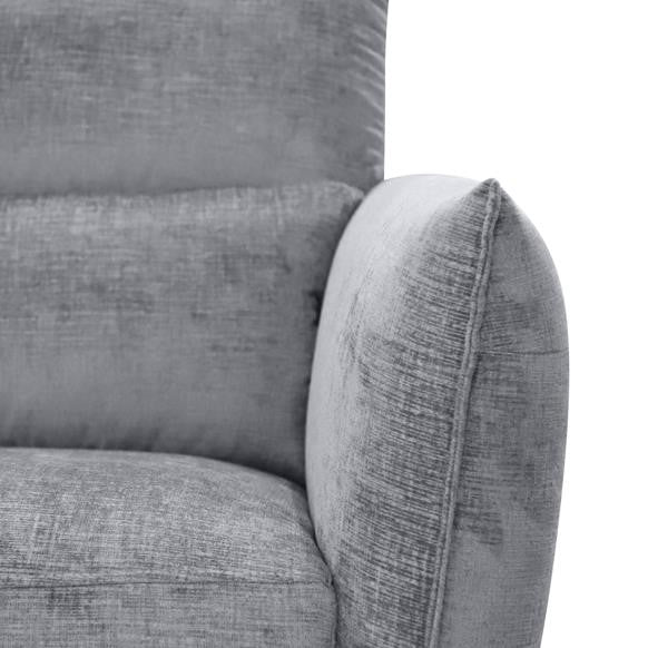 Gray textured sofa with plush cushions.