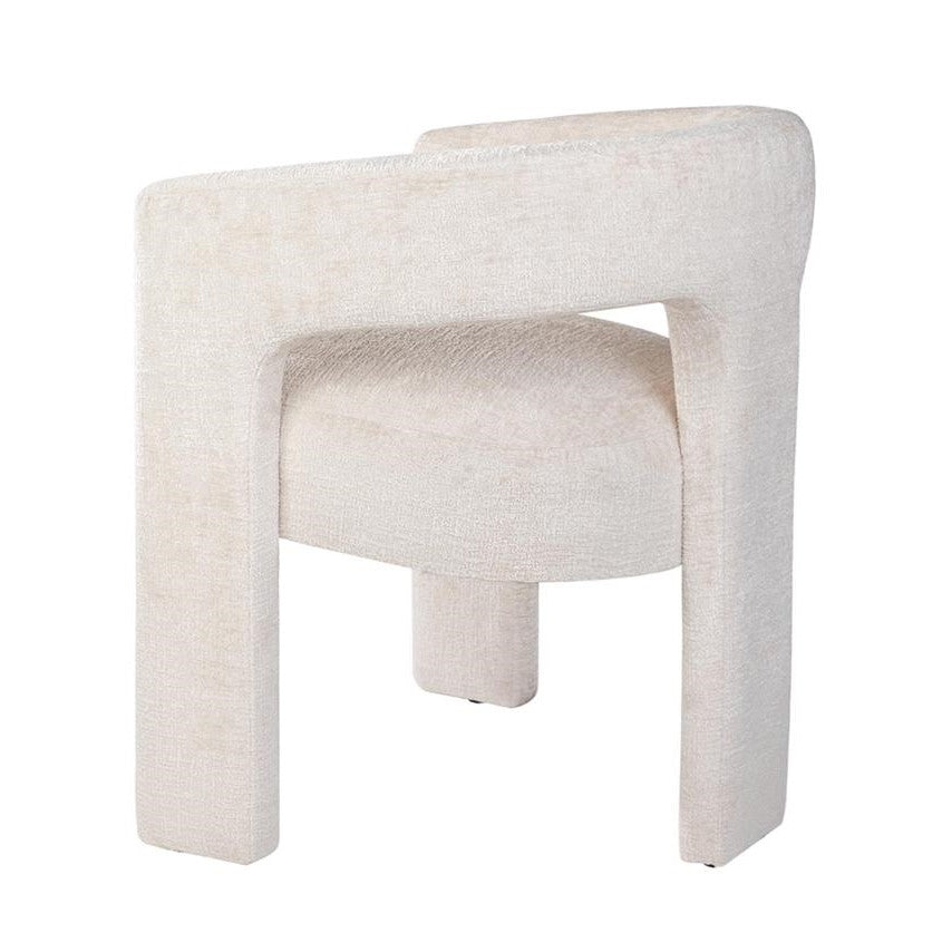 Modern beige upholstered chair with curved back.