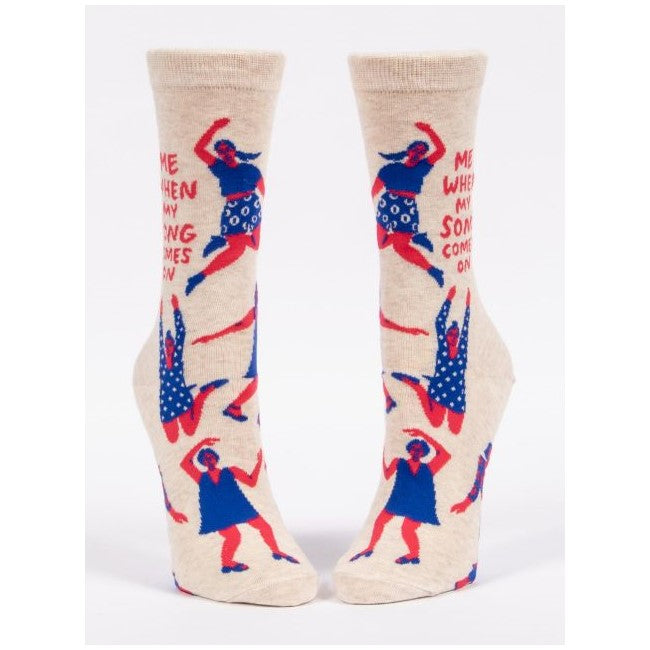 Colorful crew socks with dancing figures and playful text graphics.