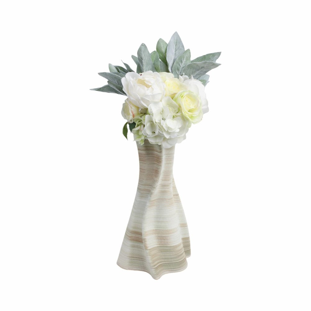 Elegant vase with white flowers and greenery.