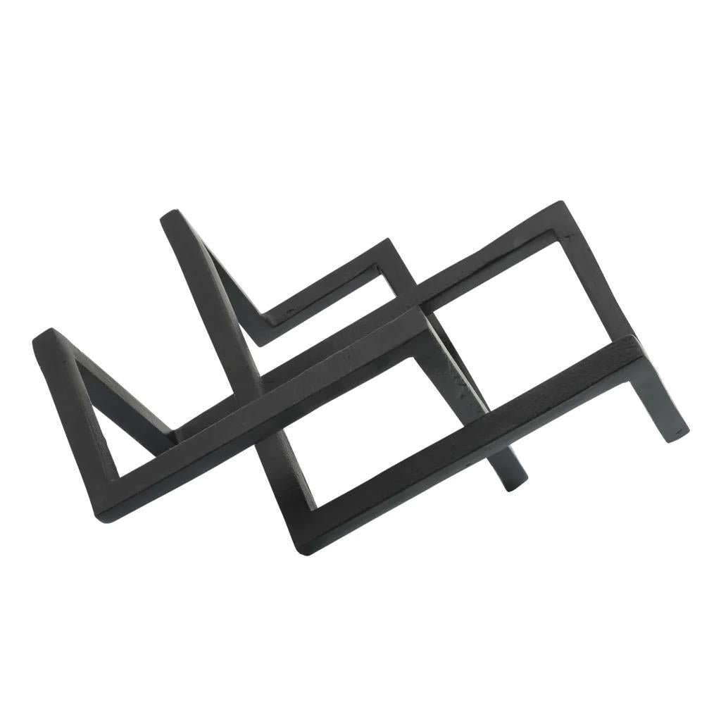 Geometric black metal sculpture with angular lines and shapes.