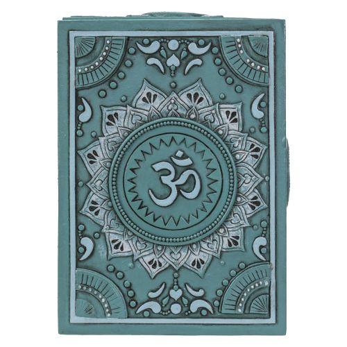 Ornate blue box with embossed Om symbol and mandala design.