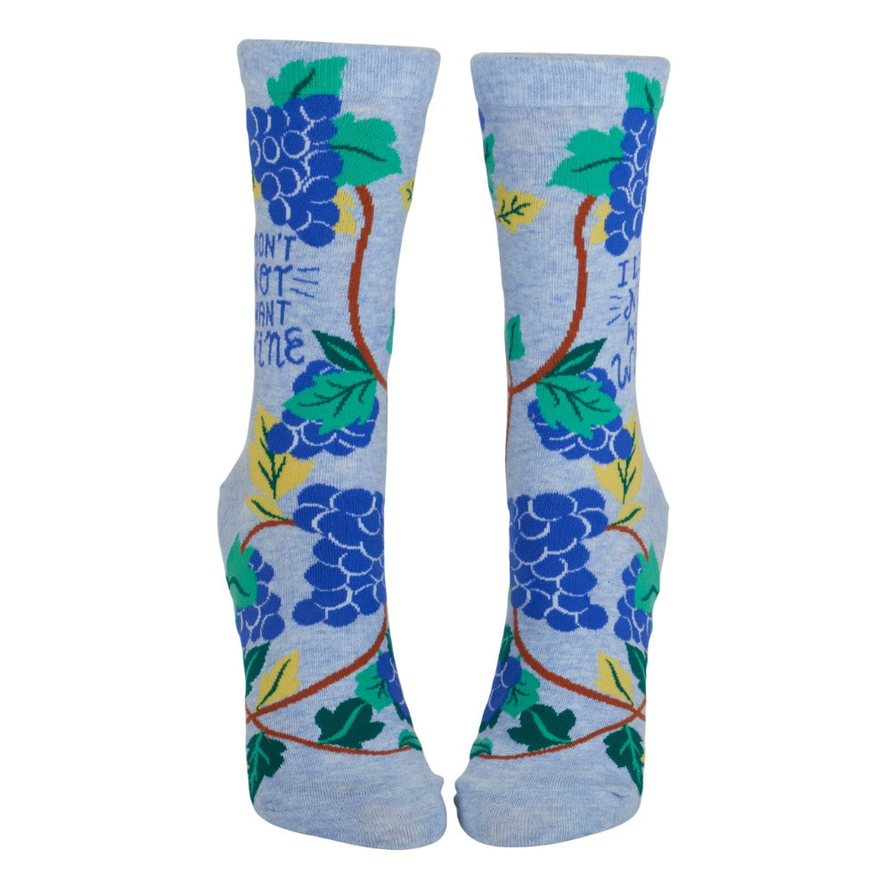 Blue socks with grapevines, leaves, and humorous text.