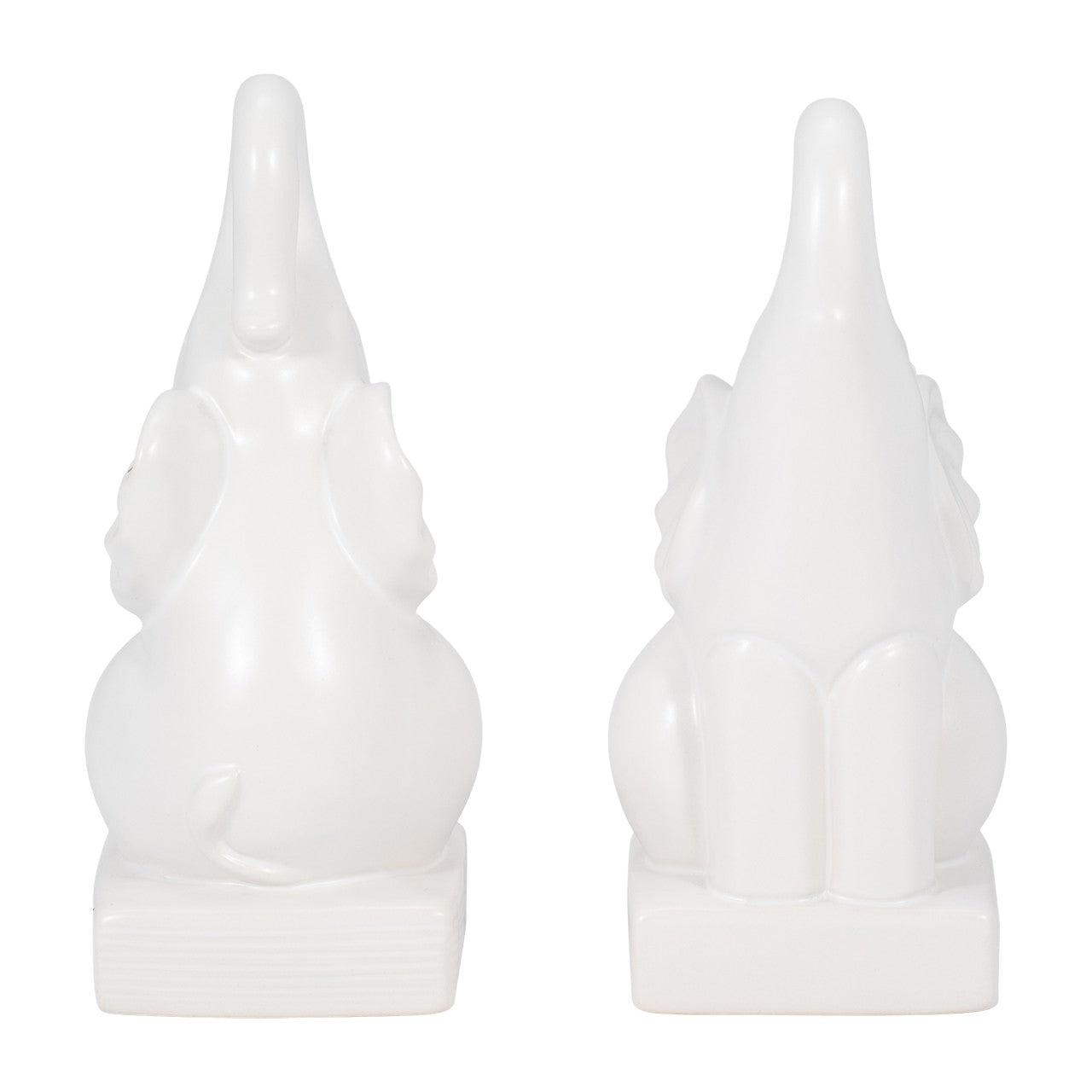 Two white elephant statues facing backward.