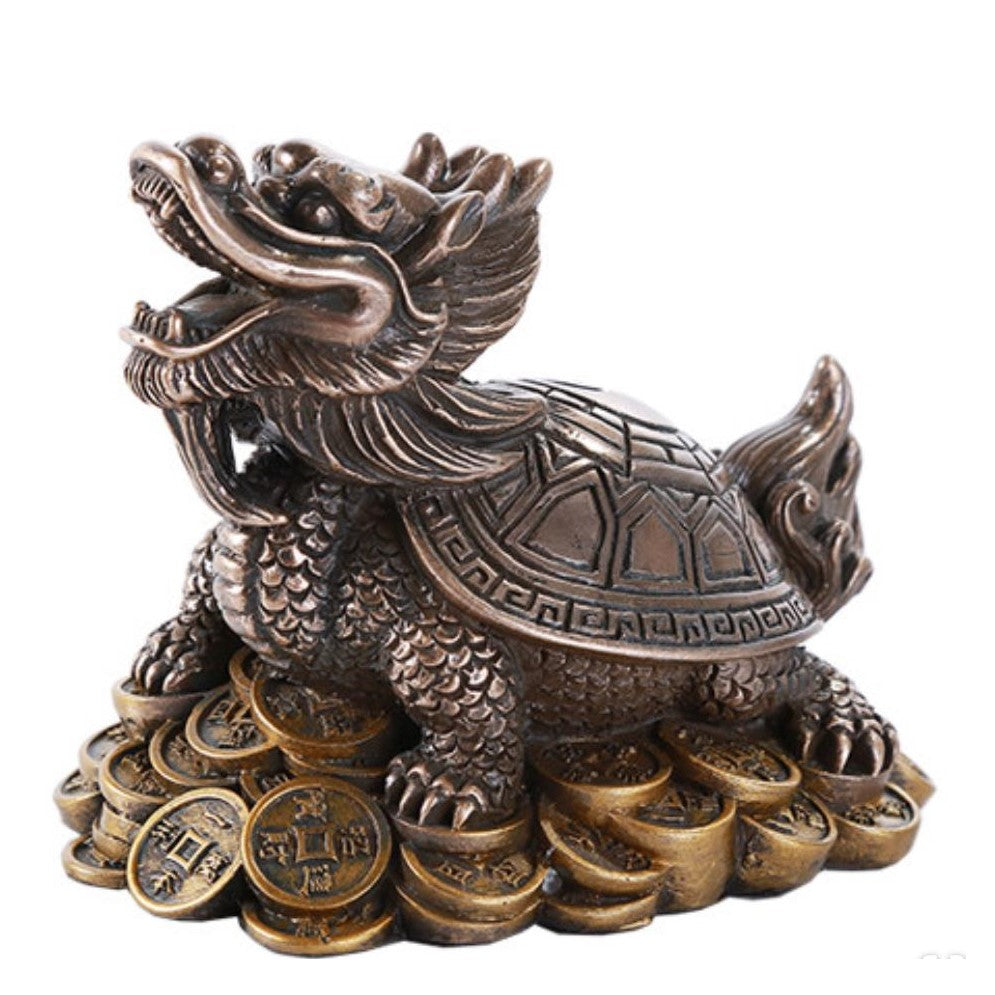 Bronze dragon turtle statue on a pile of coins.