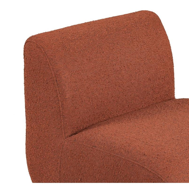Rust-colored textured chair backrest and seat.