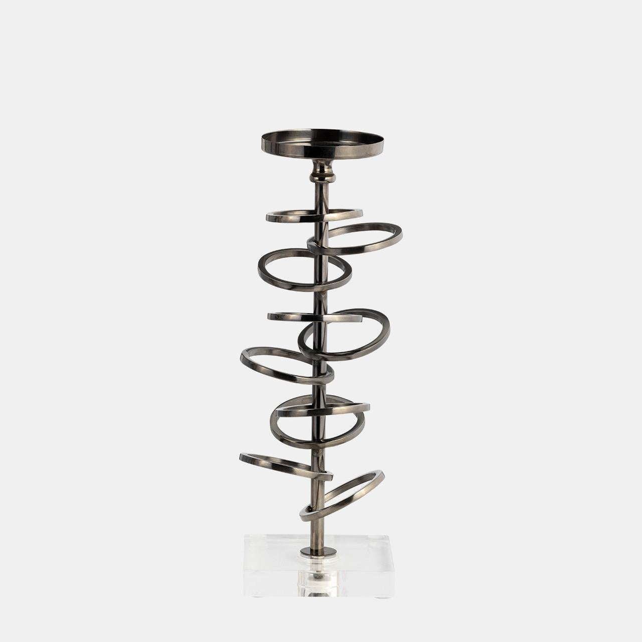 Metallic spiral candlestick on a clear base.